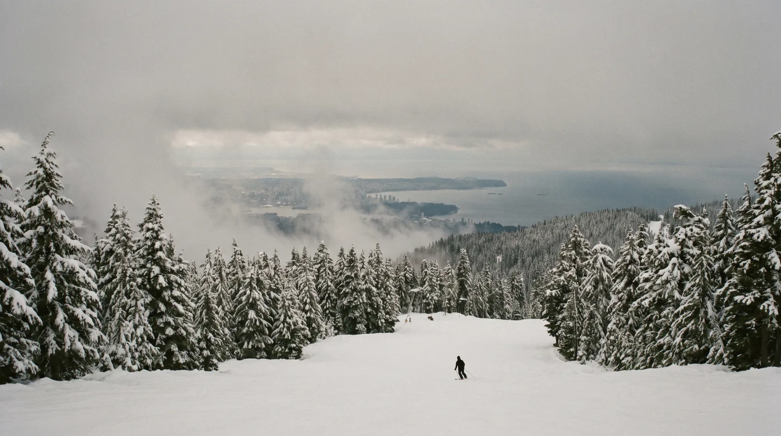The view south over Vancouver and the Strait of Georgia from the highway lookout on Cypress Bowl Road at Cypress Mountain, West Vancouver